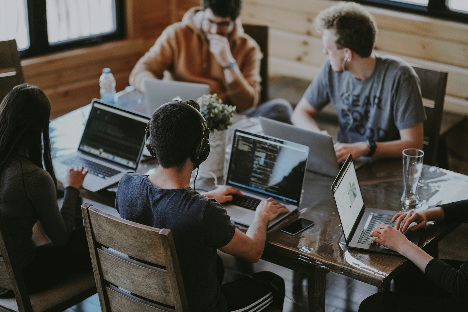 A recruitment team working together around a table